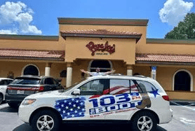 103.5 Radio Station Car out front